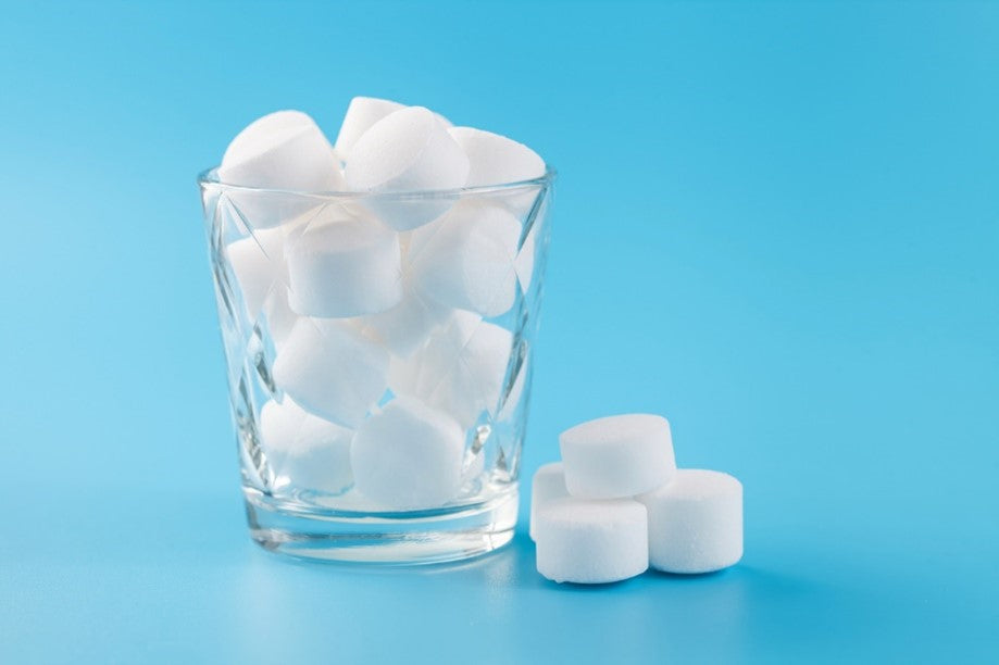 Salt Tablets for a Water Softener in a Glass